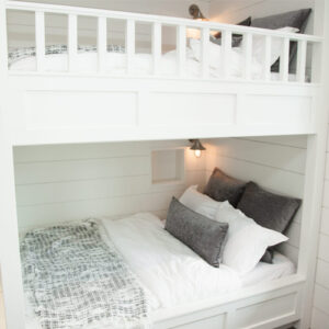 double deck bed with side lamps